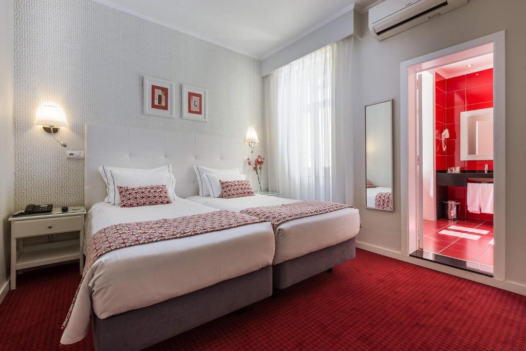 Postel nebo postele na pokoji v ubytování Hotel Florescente