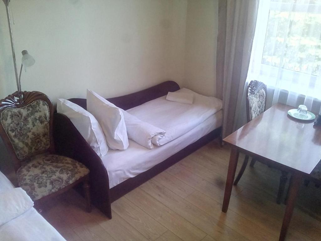 Postel nebo postele na pokoji v ubytování Sveciu Namai Avada
