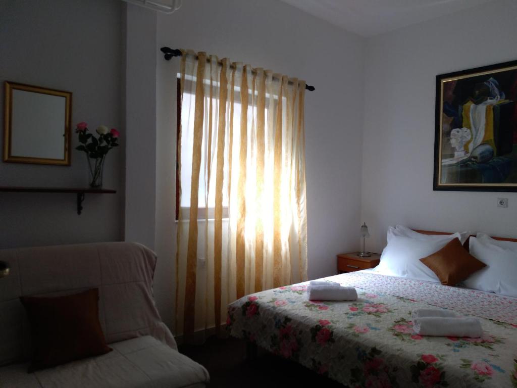 Postel nebo postele na pokoji v ubytování Guest house Villa Castio
