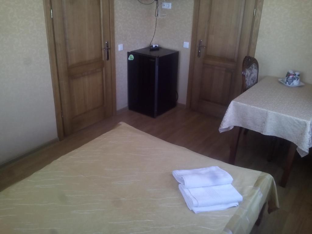 Postel nebo postele na pokoji v ubytování Sveciu Namai Avada