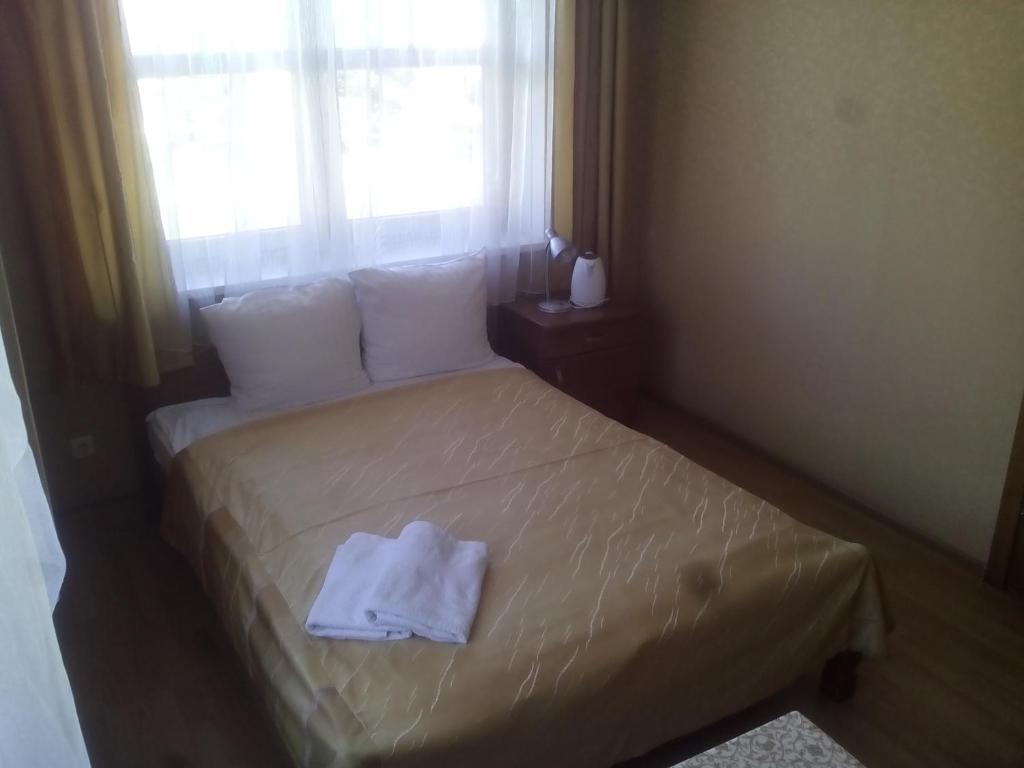 Postel nebo postele na pokoji v ubytování Sveciu Namai Avada