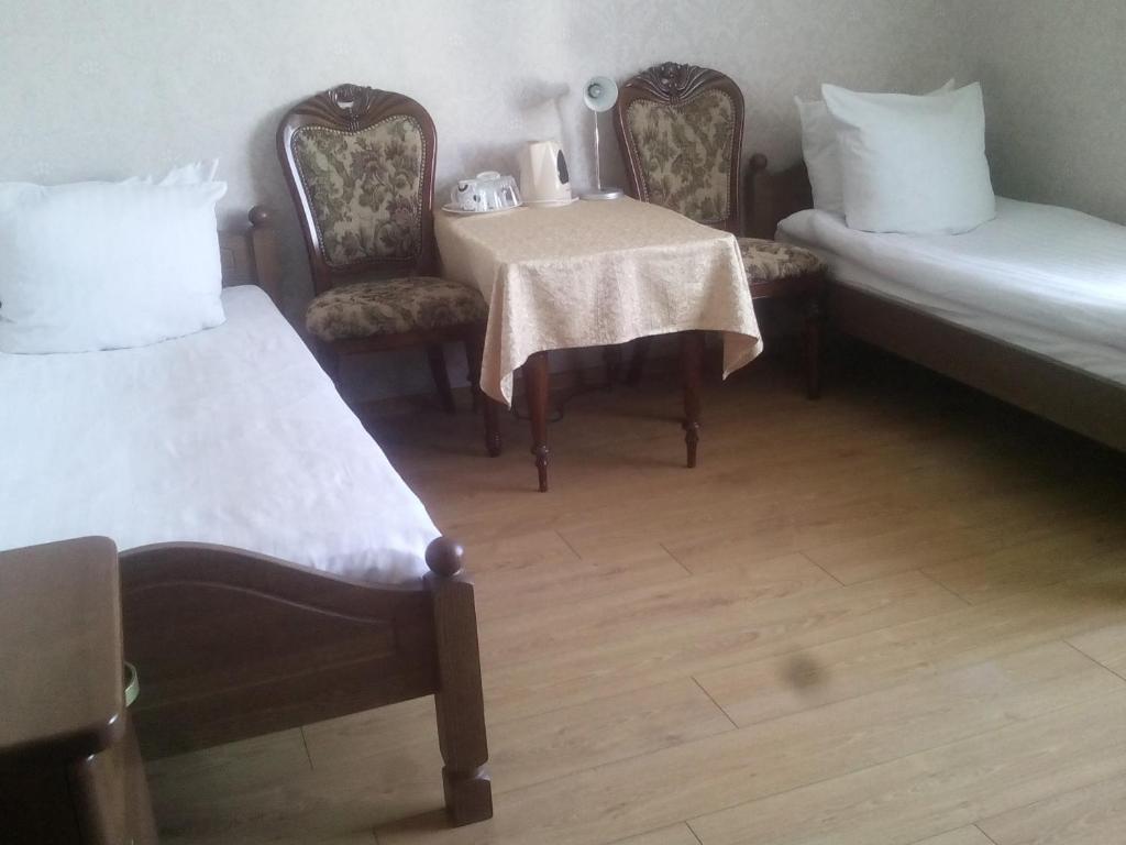 Postel nebo postele na pokoji v ubytování Sveciu Namai Avada