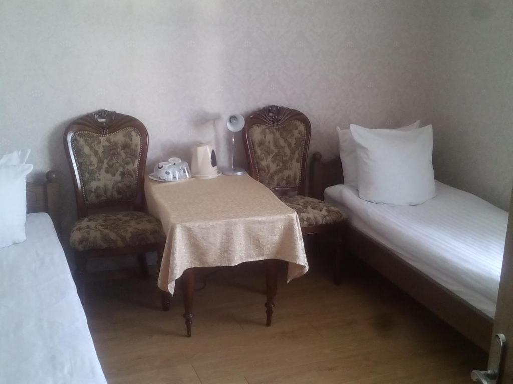 Postel nebo postele na pokoji v ubytování Sveciu Namai Avada