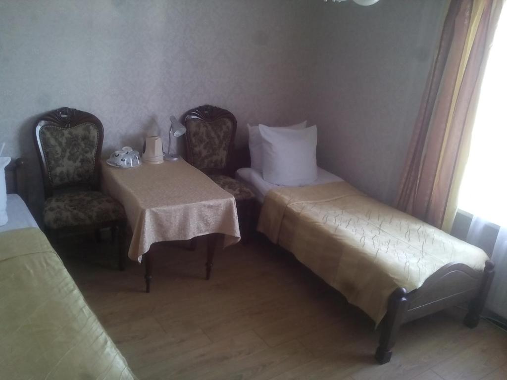 Postel nebo postele na pokoji v ubytování Sveciu Namai Avada