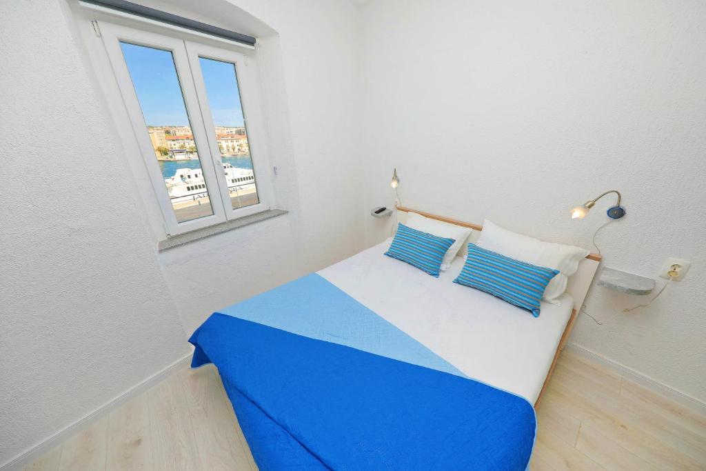 Posteľ alebo postele v izbe v ubytovaní Sea View Studio Apartment