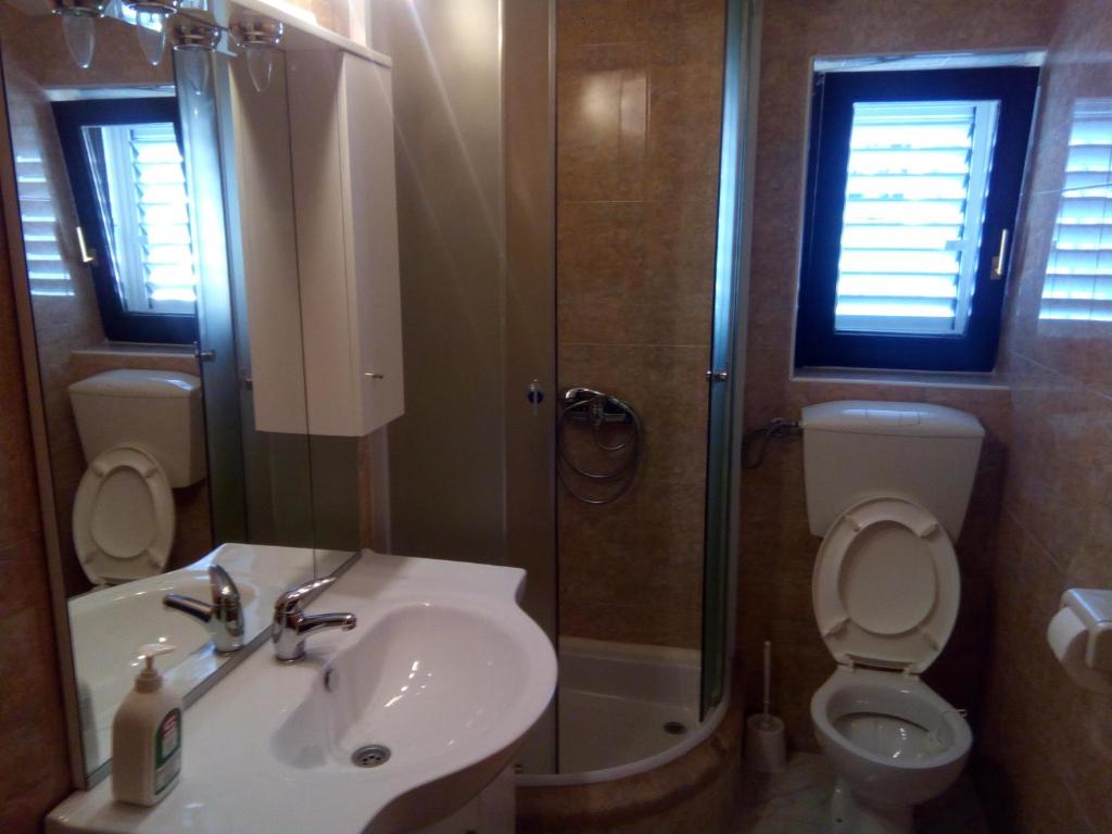 Kúpeľňa v ubytovaní Apartman GRL