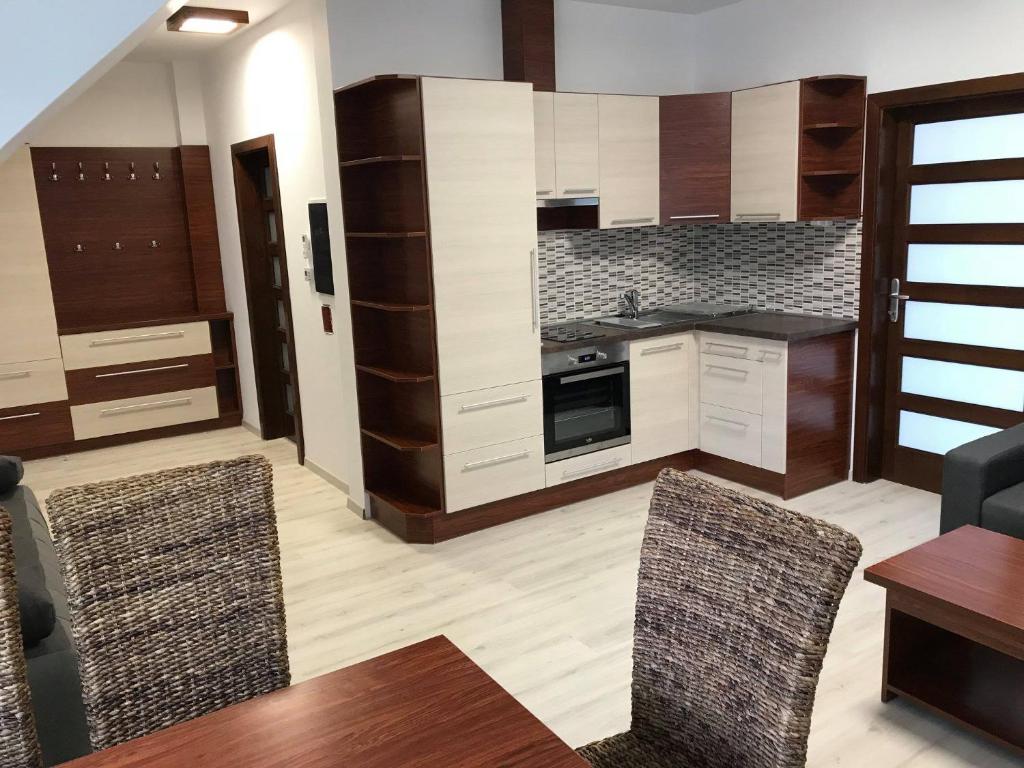 Kuchyň nebo kuchyňský kout v ubytování Kálvária Apartman
