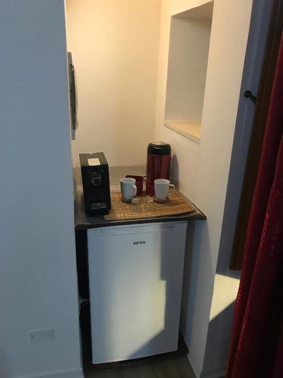 Kuchyň nebo kuchyňský kout v ubytování Decadracma rooms