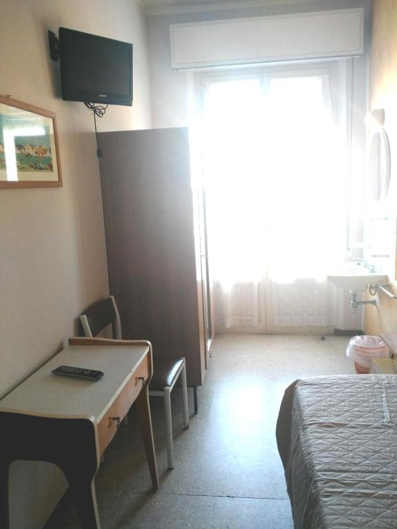 TV a/nebo společenská místnost v ubytování Hotel Marittimo