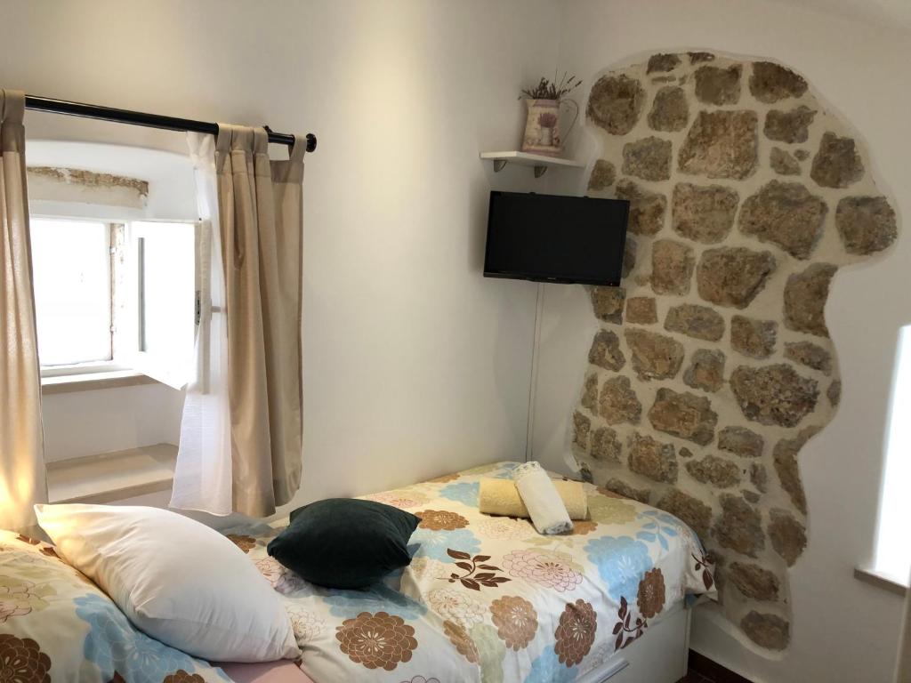 Posteľ alebo postele v izbe v ubytovaní Elegant Apartment Leila