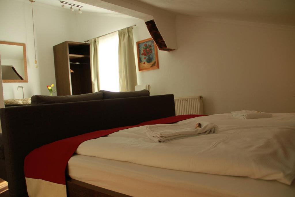 Postel nebo postele na pokoji v ubytování Frühstückspension Bachseitenhof