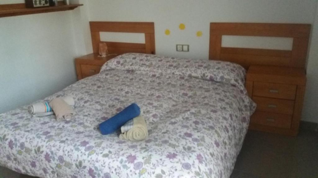 Postel nebo postele na pokoji v ubytování Casa Rural El Jardín del Hueznar