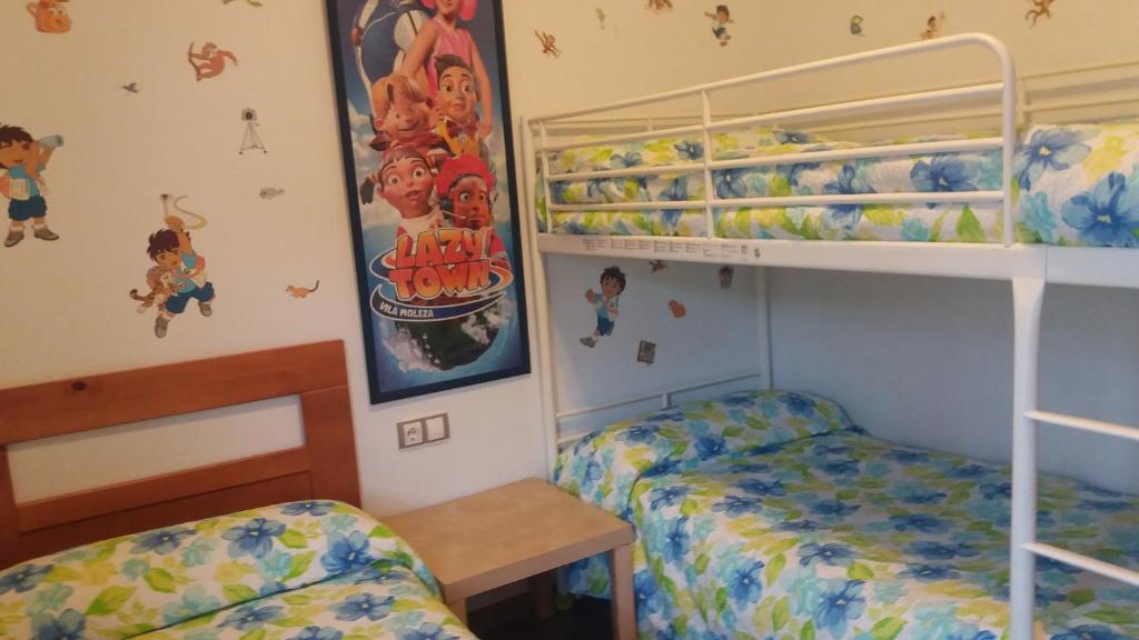 Postel nebo postele na pokoji v ubytování Casa Rural El Jardín del Hueznar