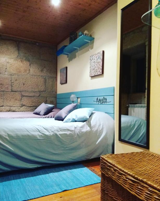 Postel nebo postele na pokoji v ubytování La Torre Mondariz