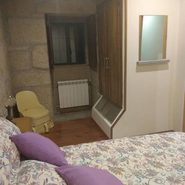 Postel nebo postele na pokoji v ubytování La Torre Mondariz