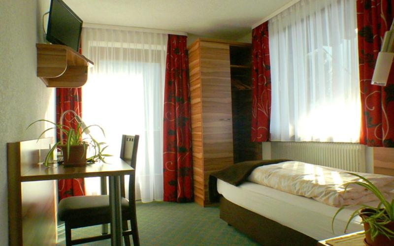 Postel nebo postele na pokoji v ubytování Gasthof Pension Alpenblick