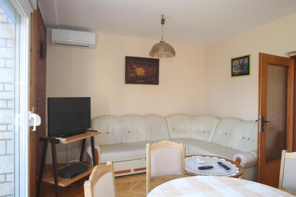 Telewizja i/lub zestaw kina domowego w obiekcie Apartment Michelle