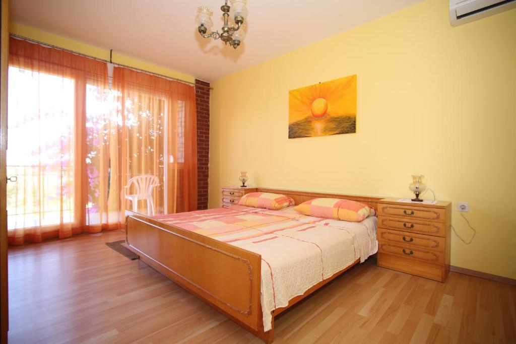 Łóżko lub łóżka w pokoju w obiekcie Apartment Michelle