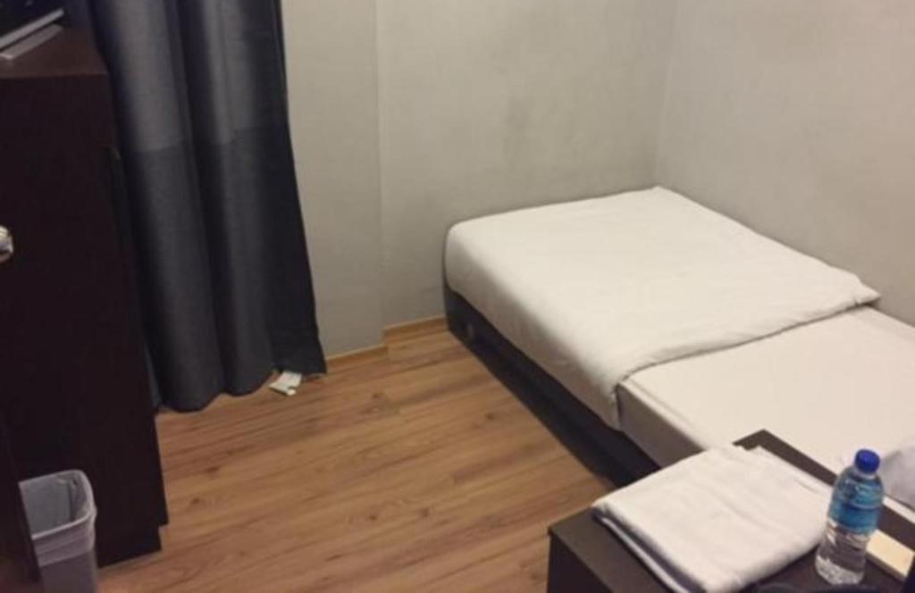 Postel nebo postele na pokoji v ubytování Hotel Conforto