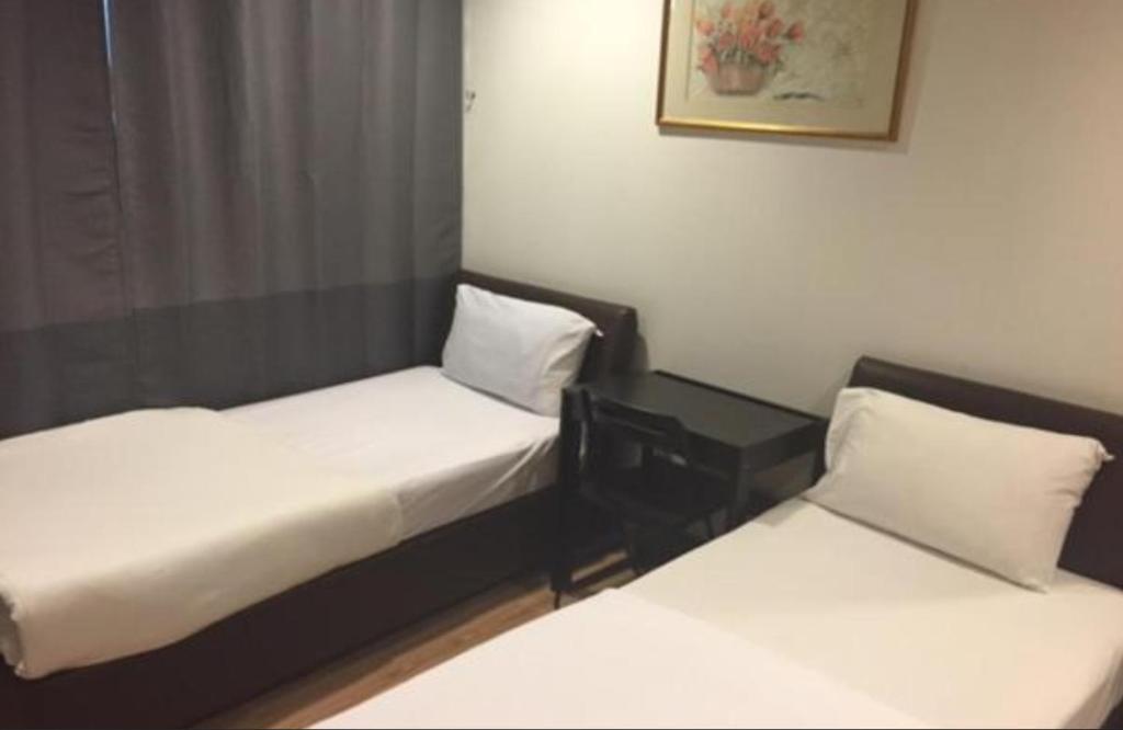 Postel nebo postele na pokoji v ubytování Hotel Conforto
