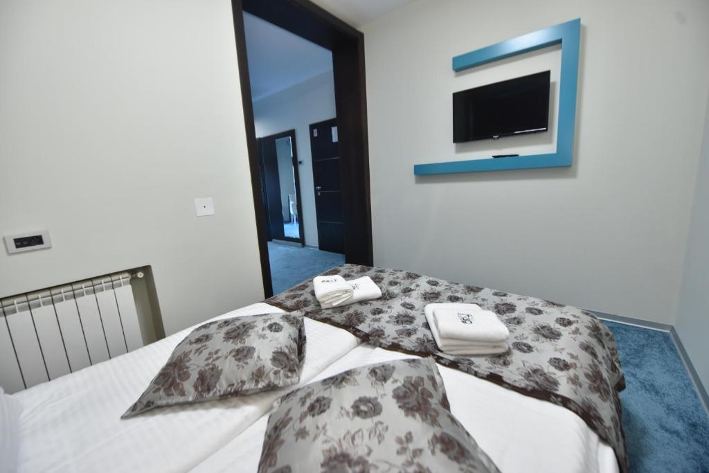 Letto o letti in una camera di City Code In Joy