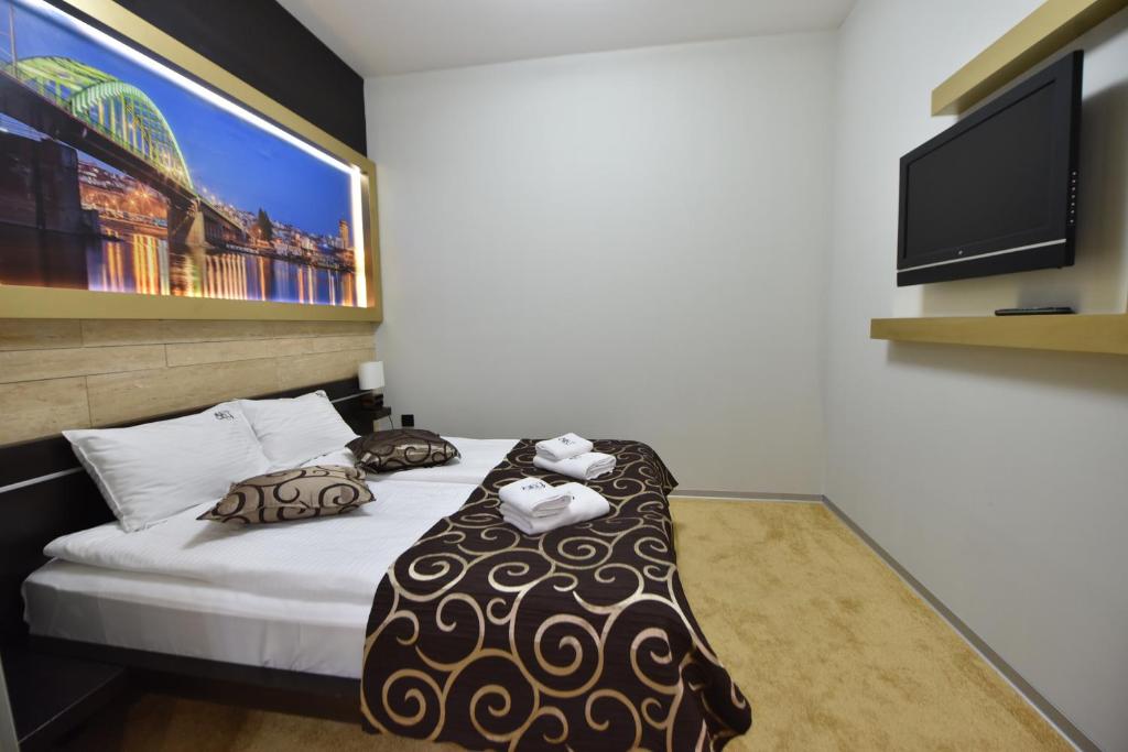 Letto o letti in una camera di City Code In Joy