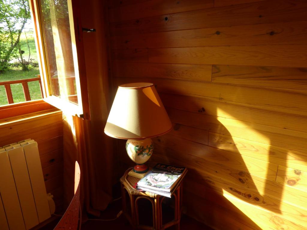 Posezení v ubytování Chalet aux pied des vignes