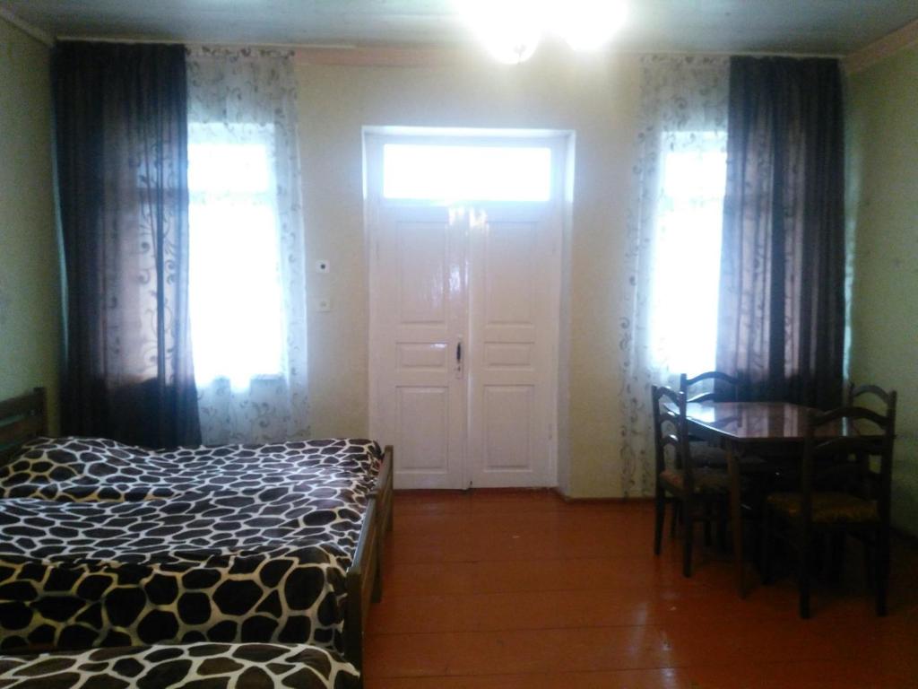 Postel nebo postele na pokoji v ubytování Guest house Katia
