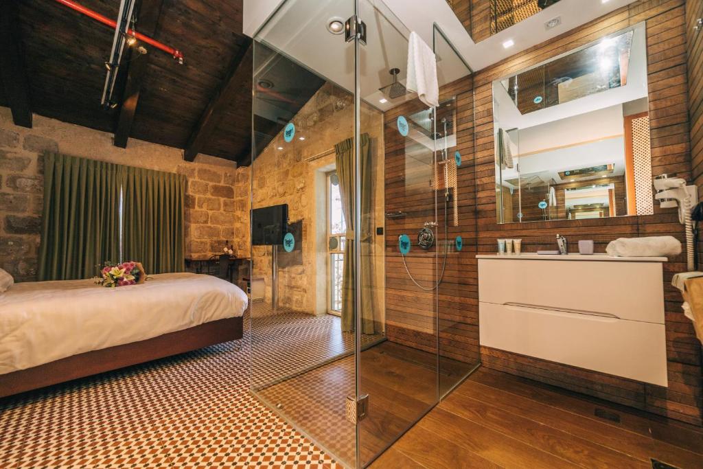 Postel nebo postele na pokoji v ubytování Templers House Boutique hotel