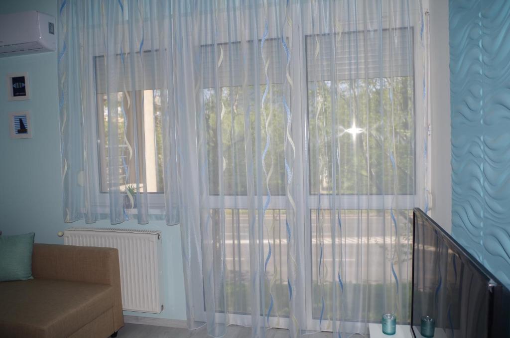 Część wypoczynkowa w obiekcie Aquamarin Studio Apartman