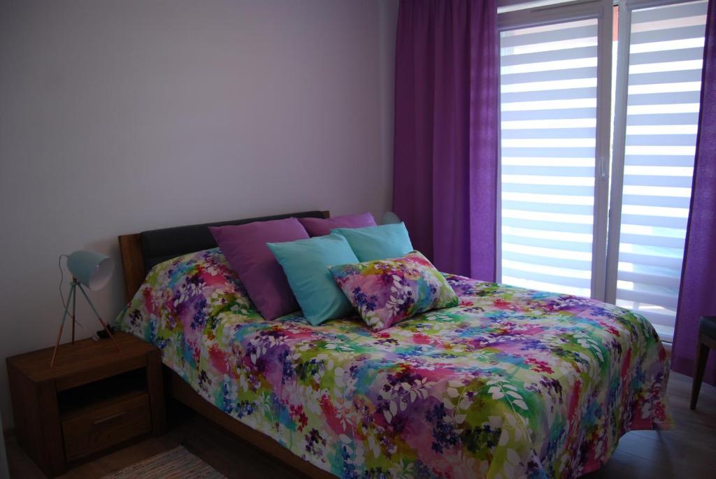 Posteľ alebo postele v izbe v ubytovaní Spring & Summer Apartments Polanki Park
