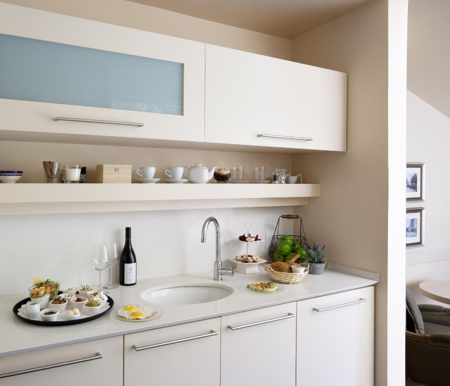 Kuchyň nebo kuchyňský kout v ubytování Templers House Boutique hotel