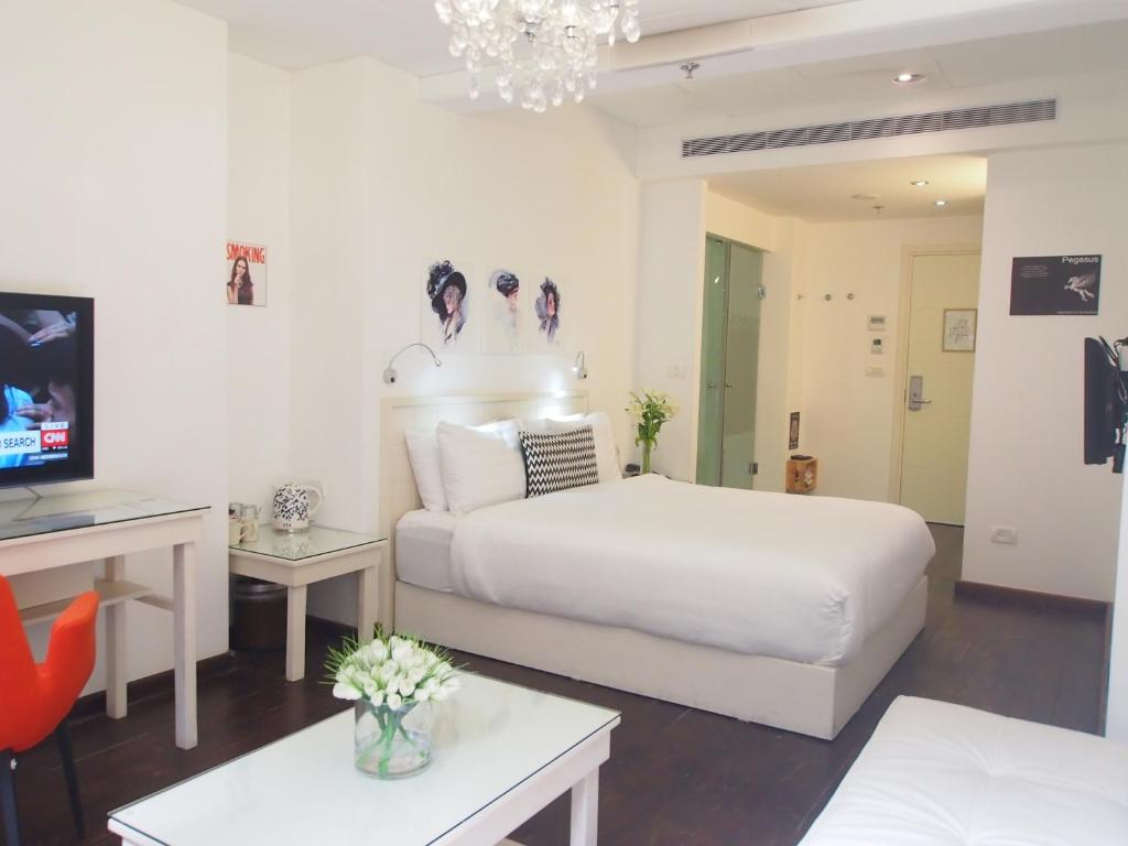 TV a/nebo společenská místnost v ubytování Templers House Boutique hotel