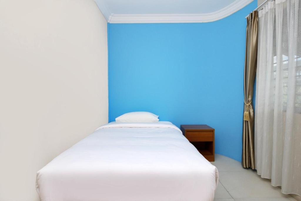 Safina Inn Syariah Sekupang Batam - Camera Singola