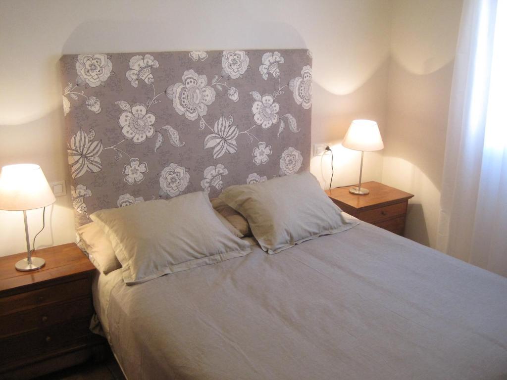 Postel nebo postele na pokoji v ubytování Apartamentos La Llum