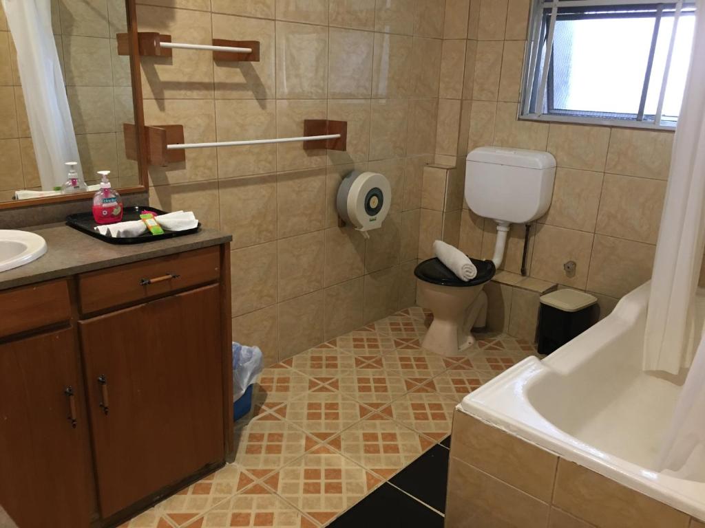 Koupelna v ubytování Tagimoucia House Hotel