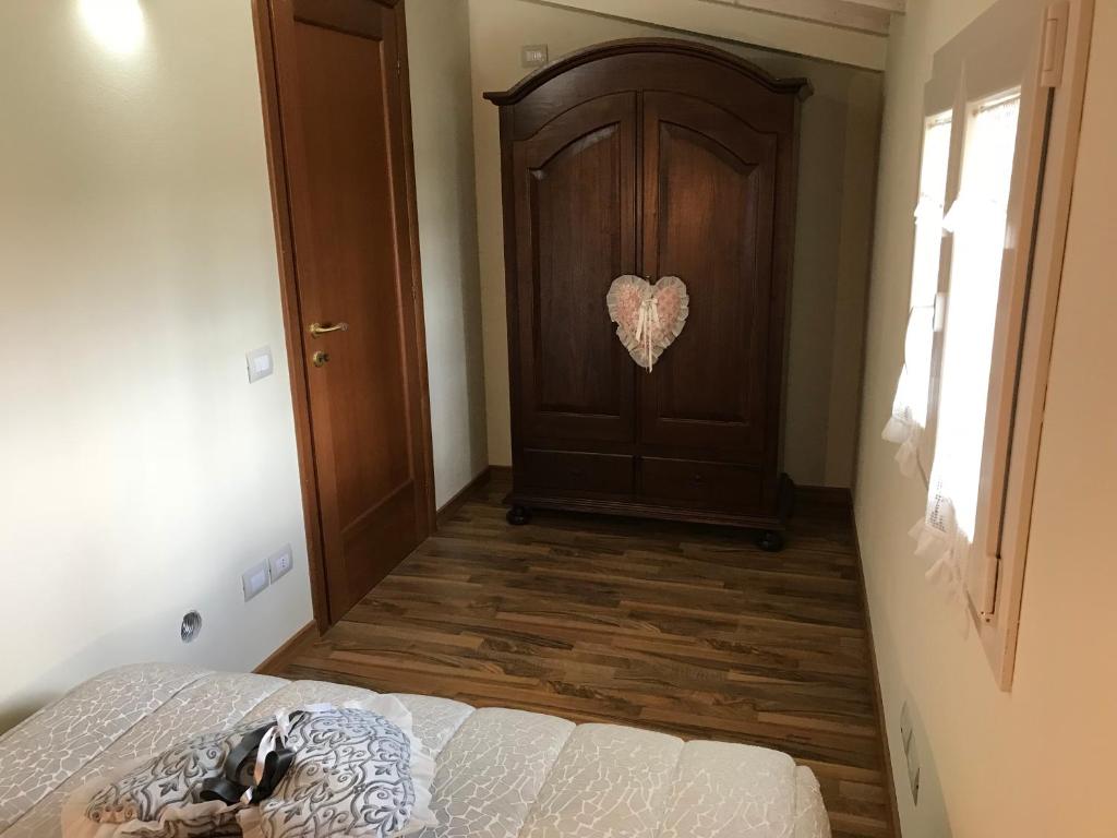 Posteľ alebo postele v izbe v ubytovaní La Camelia