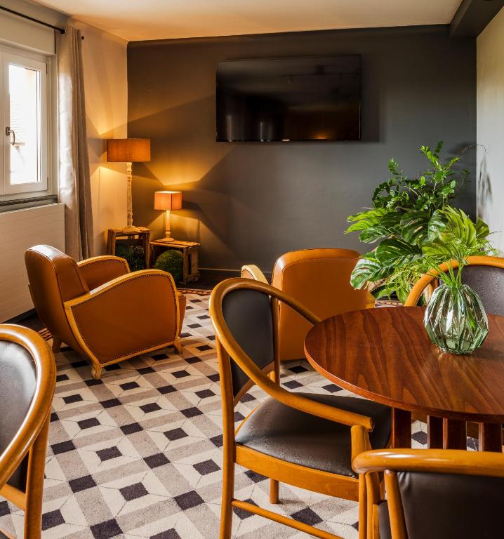 TV a/nebo společenská místnost v ubytování Hotel Restaurant Au Riesling
