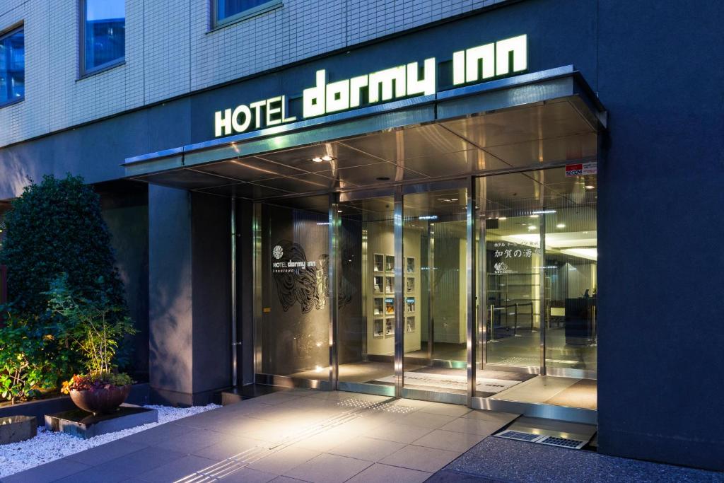 a hotel lamillian mall with its doors open at Dormy Inn Kanazawa Natural Hot Spring in Kanazawa