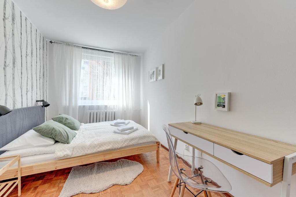 Posteľ alebo postele v izbe v ubytovaní Gdańsk Comfort Apartments Wejhera