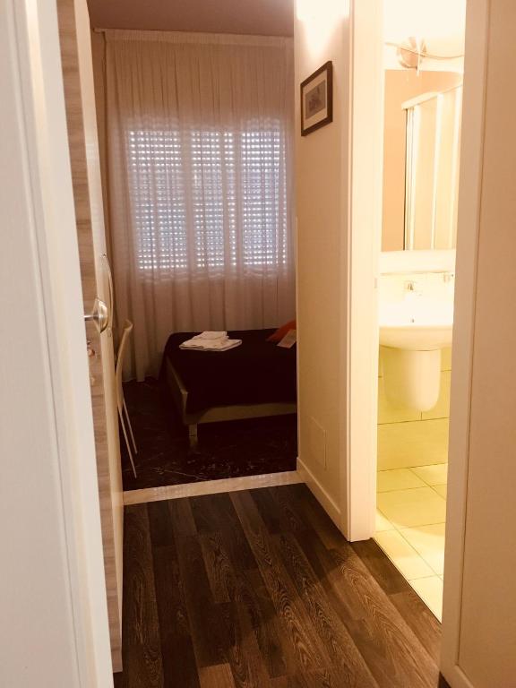 Postel nebo postele na pokoji v ubytování Emme B&B