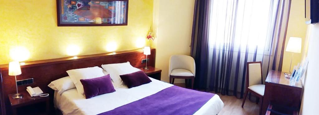 Postel nebo postele na pokoji v ubytování Hotel Rosa & Spa Begur
