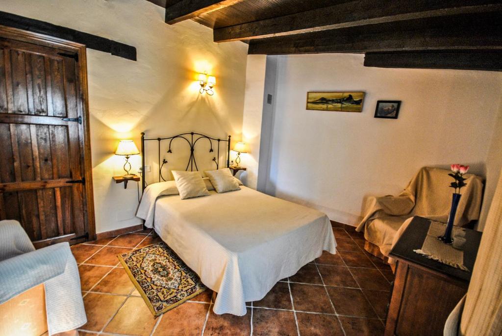 Cama o camas de una habitación en Cortijo Las Monjas
