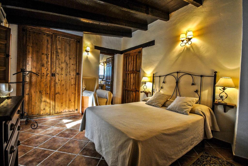 Cama o camas de una habitación en Cortijo Las Monjas