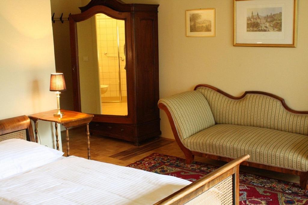 Postel nebo postele na pokoji v ubytování Hotel Garni - Appartements Fuksas