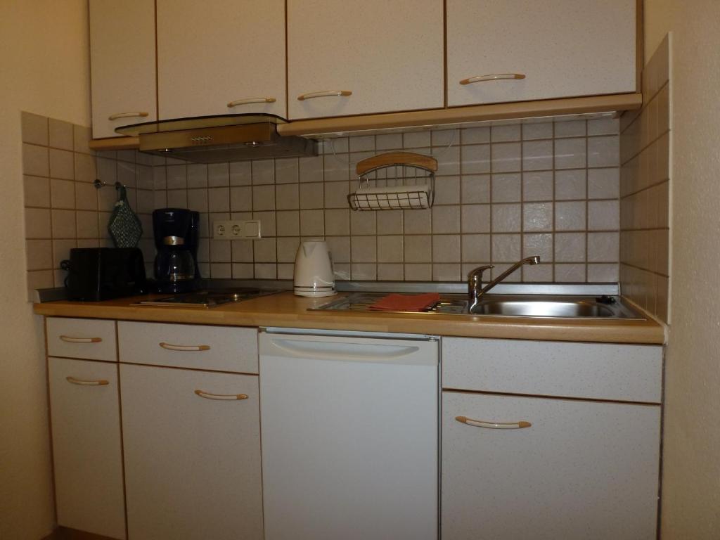 Kuchyň nebo kuchyňský kout v ubytování Appartements Leibold