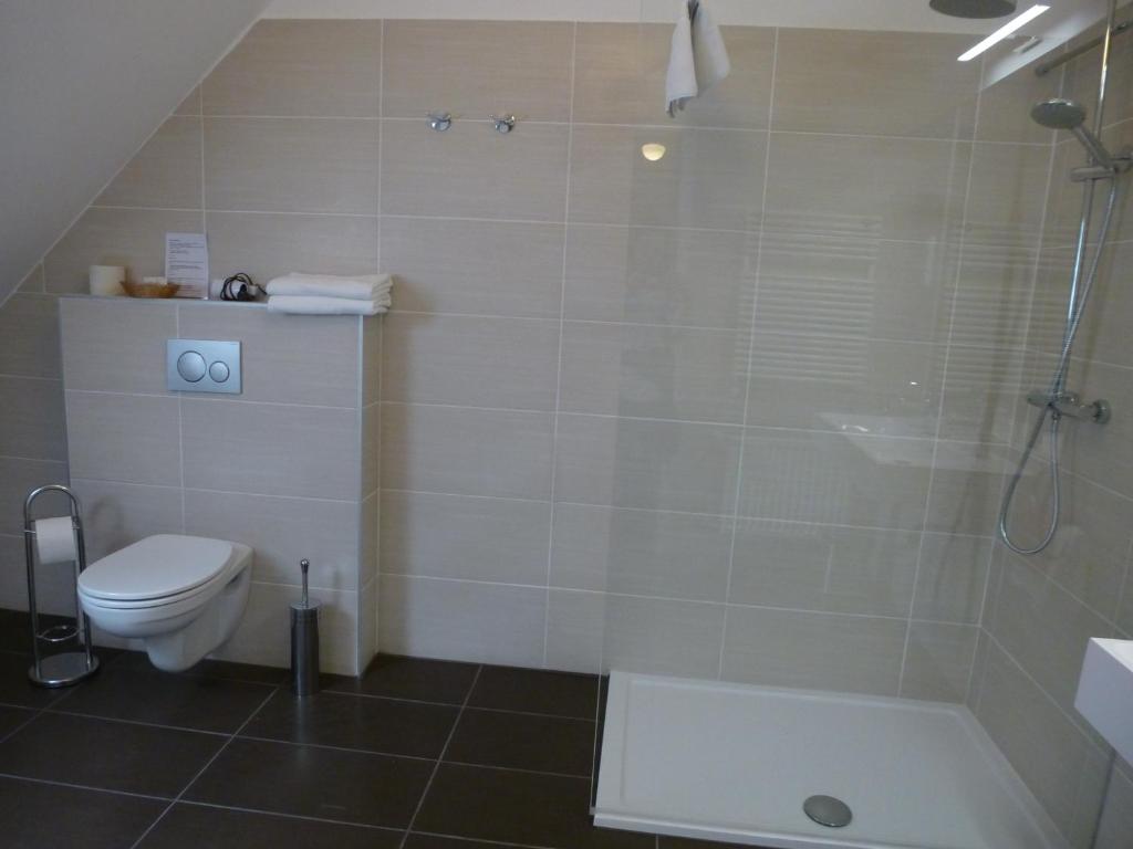 Koupelna v ubytování Albergo Giardino
