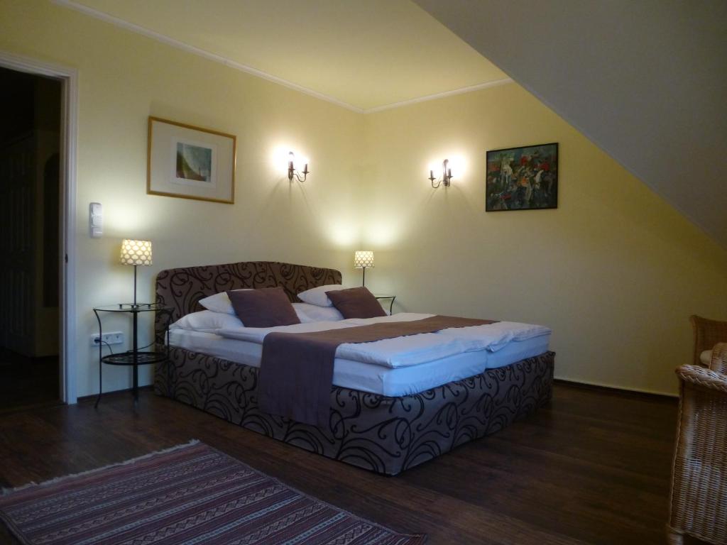 Postel nebo postele na pokoji v ubytování Albergo Giardino