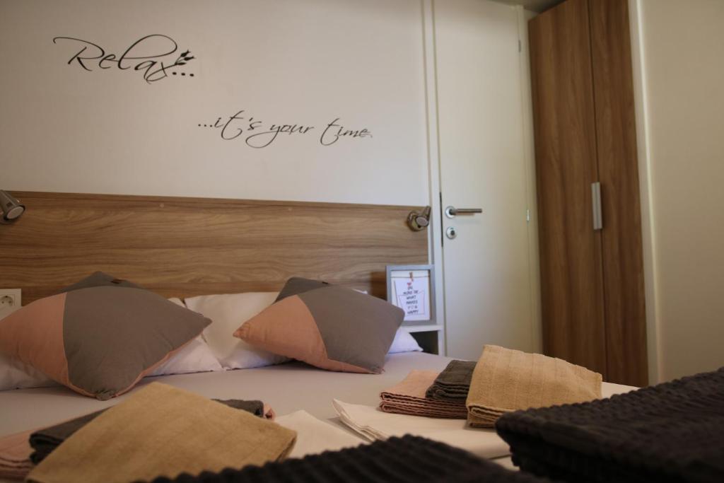Postel nebo postele na pokoji v ubytování Mobile home Laurus