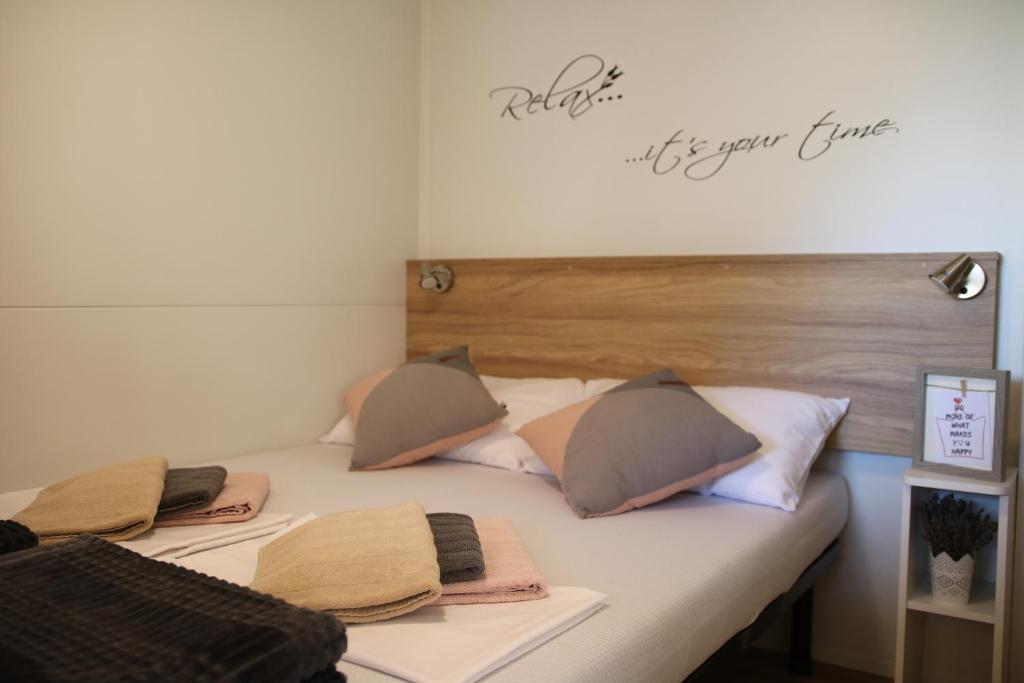 Postel nebo postele na pokoji v ubytování Mobile home Laurus